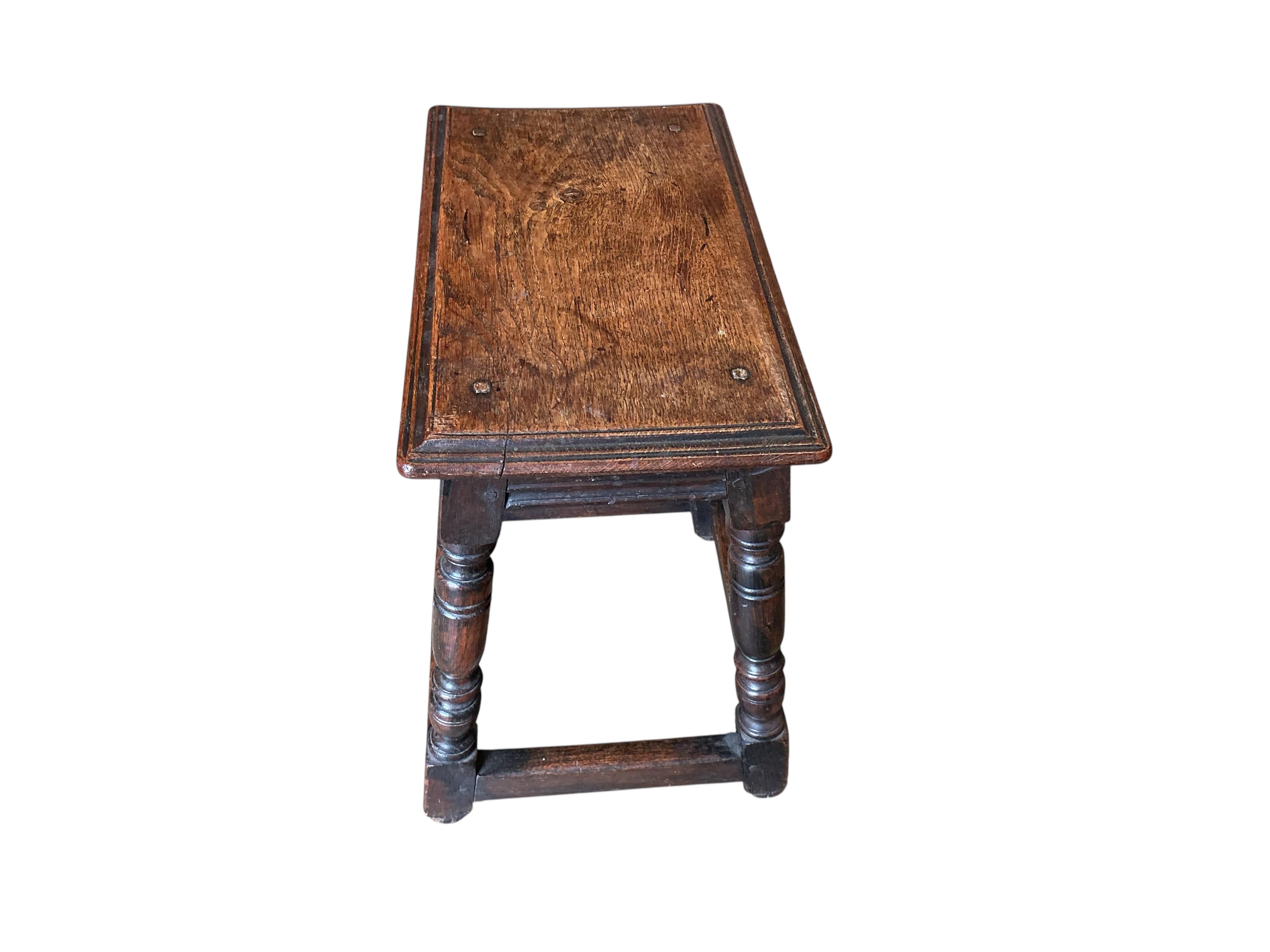 A 17th century style oak joint stool, width 46cm, depth 26cm, height 52cm